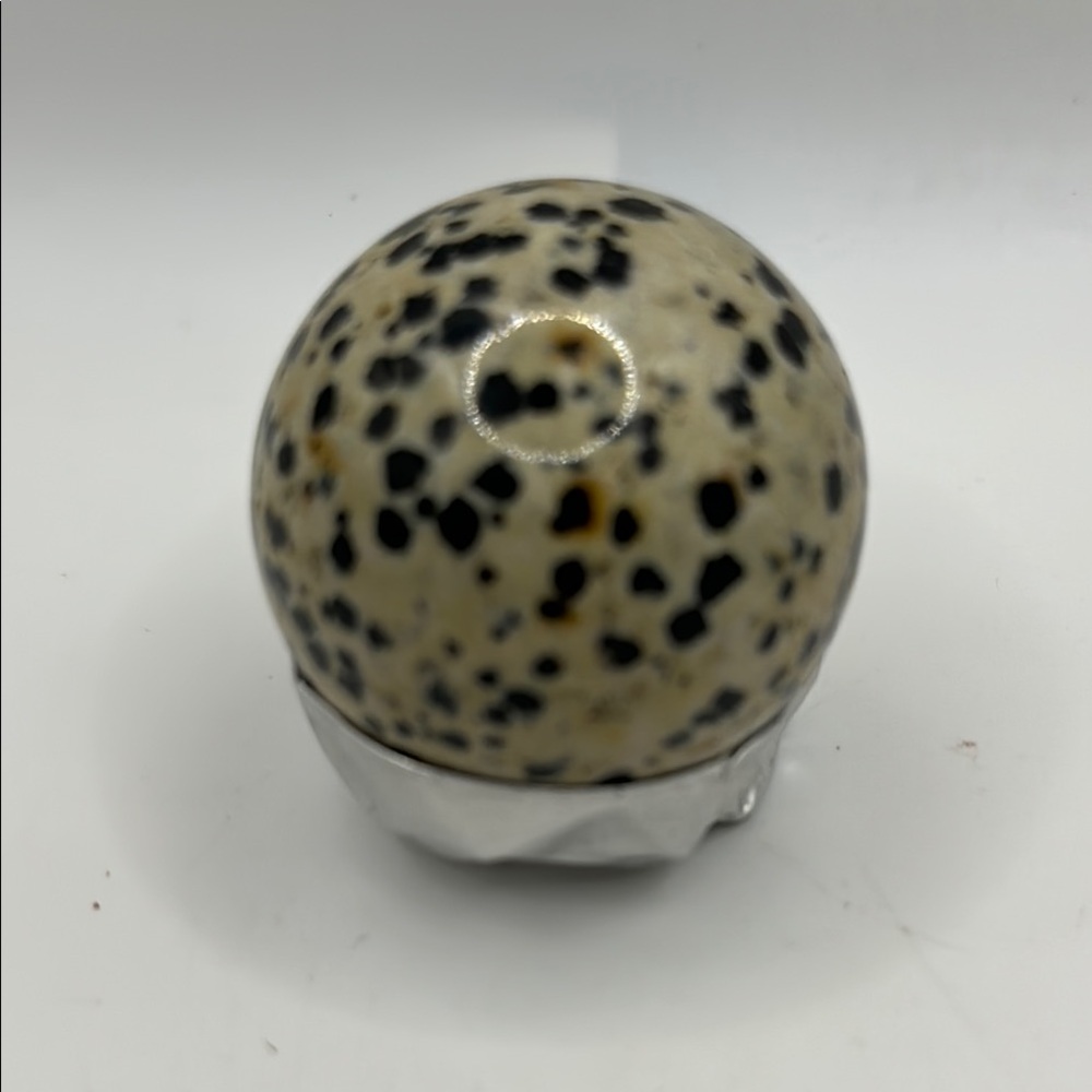 Speckled Dalmatian Jasper crystal sphere.